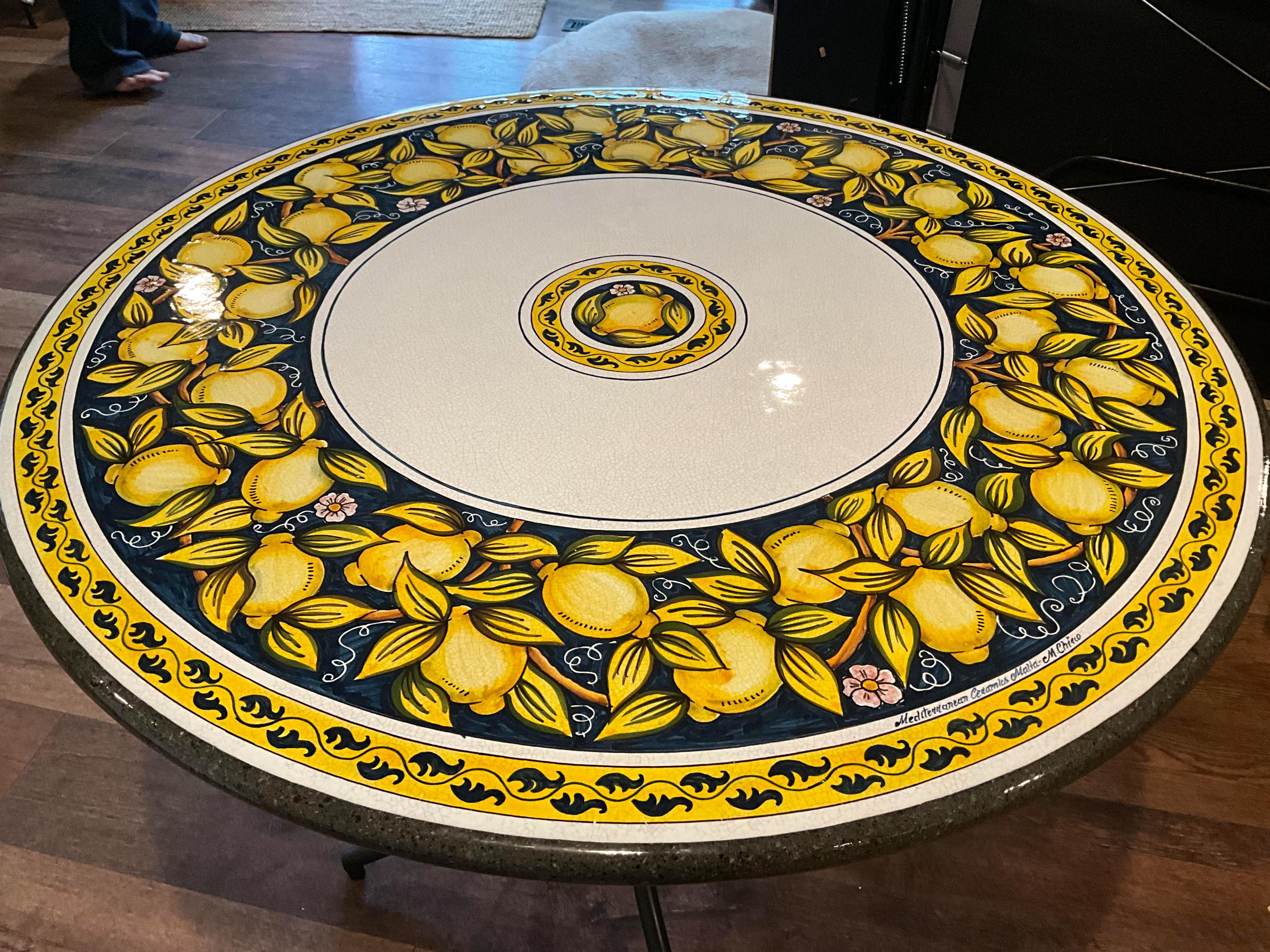 A Hand-Painted Maltese Lava Table with lemon: A Durable and Exquisite Piece